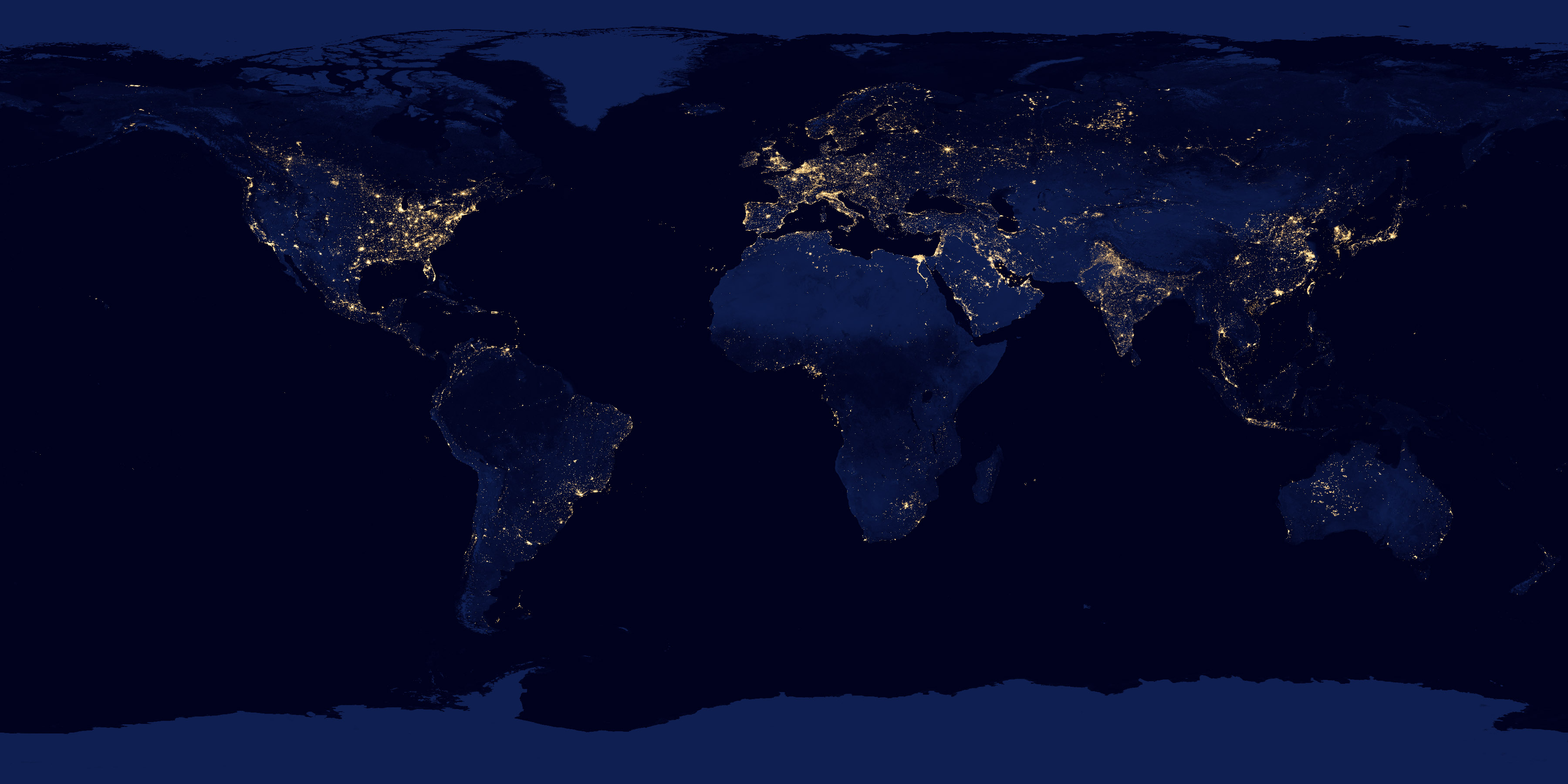 Earth at night showing connected cities across the globe